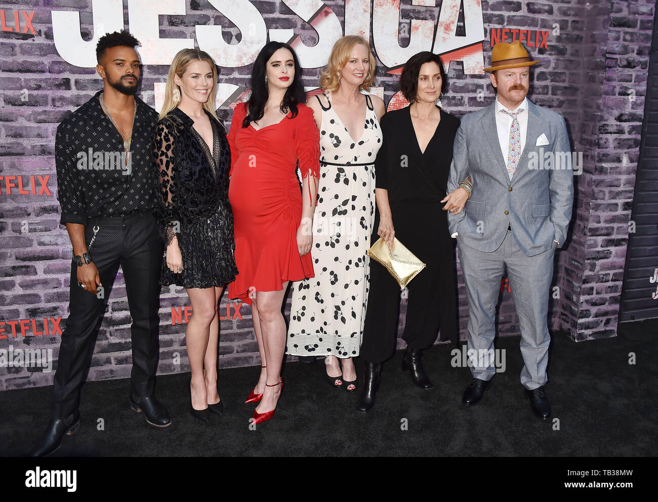 HOLLYWOOD, CA - MAY 28: (L-R) Eka Darville, Rachael Taylor, Krysten Ritter, Melissa Rosenberg, Carrie-Anne Moss and Jeremy Bobb attend a Special Screening Of Netflix's 'Jessica Jones' Season 3 at ArcLight Hollywood on May 28, 2019 in Hollywood, California. Stock Photo