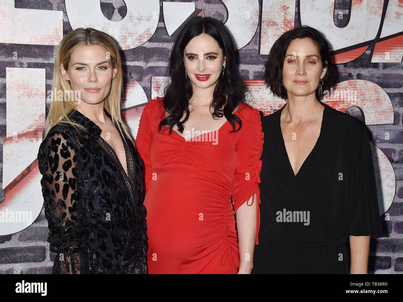 HOLLYWOOD, CA - MAY 28: (L-R) Rachael Taylor, Krysten Ritter and Carrie-Anne Moss attend a Special Screening Of Netflix's 'Jessica Jones' Season 3 at ArcLight Hollywood on May 28, 2019 in Hollywood, California. Stock Photo