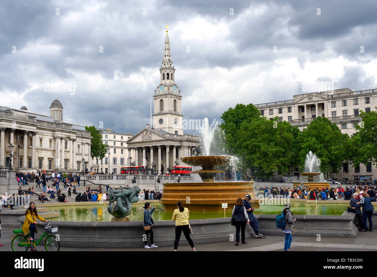 Everyday lifestyle at Trafalgar Square, Westminster, London, England, UK Stock Photo