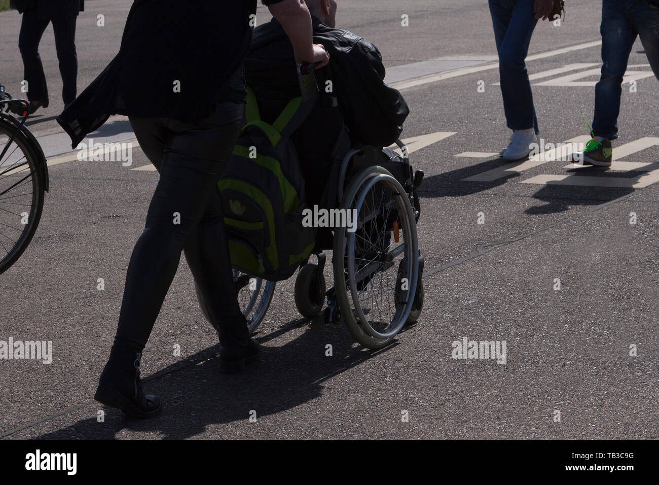 Disabled woman in a wheelchair, Berlin, Germany Stock Photo Alamy