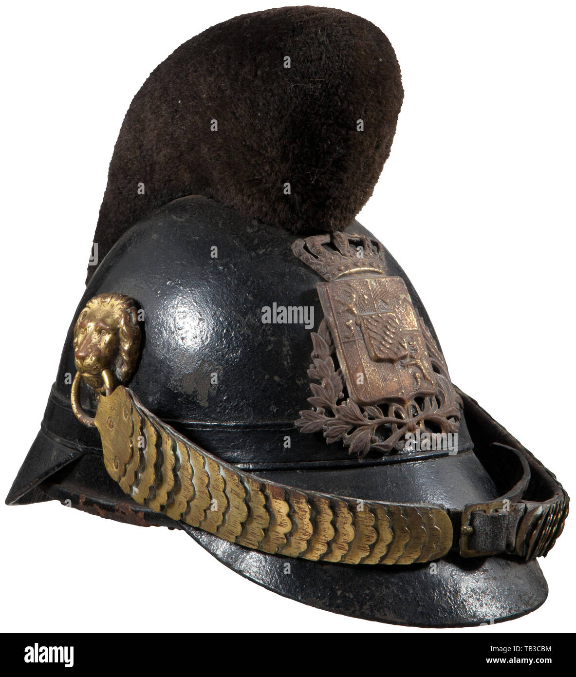 An Imperial German M 1868 Raupen helmet for enlisted men of the Bavarian cavalry, Black leather body with front and rear visor, black felt comb, gold Bavarian crowned crest front plate attached by four split brads (splintas), gold chinstraps with lion head side posts, black leather liner (tear and shows age), Bavarian state cockade (colours worn off), fine example of early model helmet. USA-lot. Bavaria, Bavarian, German, Germany, Southern Germany, the South of Germany, object, objects, stills, militaria, clipping, cut out, cut-out, cut-outs, his, Additional-Rights-Clearance-Info-Not-Available Stock Photo