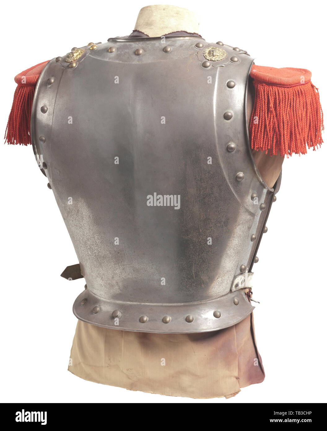 A French Napoleonic cuirass, Metal body with brass hobnails, silver scale straps with gold buckles on front and lion head hinges on back, white leather belly straps, no liner, long tongue red fringed epaulettes, slight pitting and surface rust overall. USA-lot. France, Imperial, French Empire, object, objects, stills, clipping, cut out, cut-out, cut-outs, historic, historical 19th century, Additional-Rights-Clearance-Info-Not-Available Stock Photo