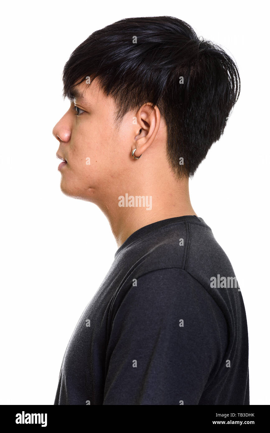 Close up profile view of cool handsome Asian man Stock Photo