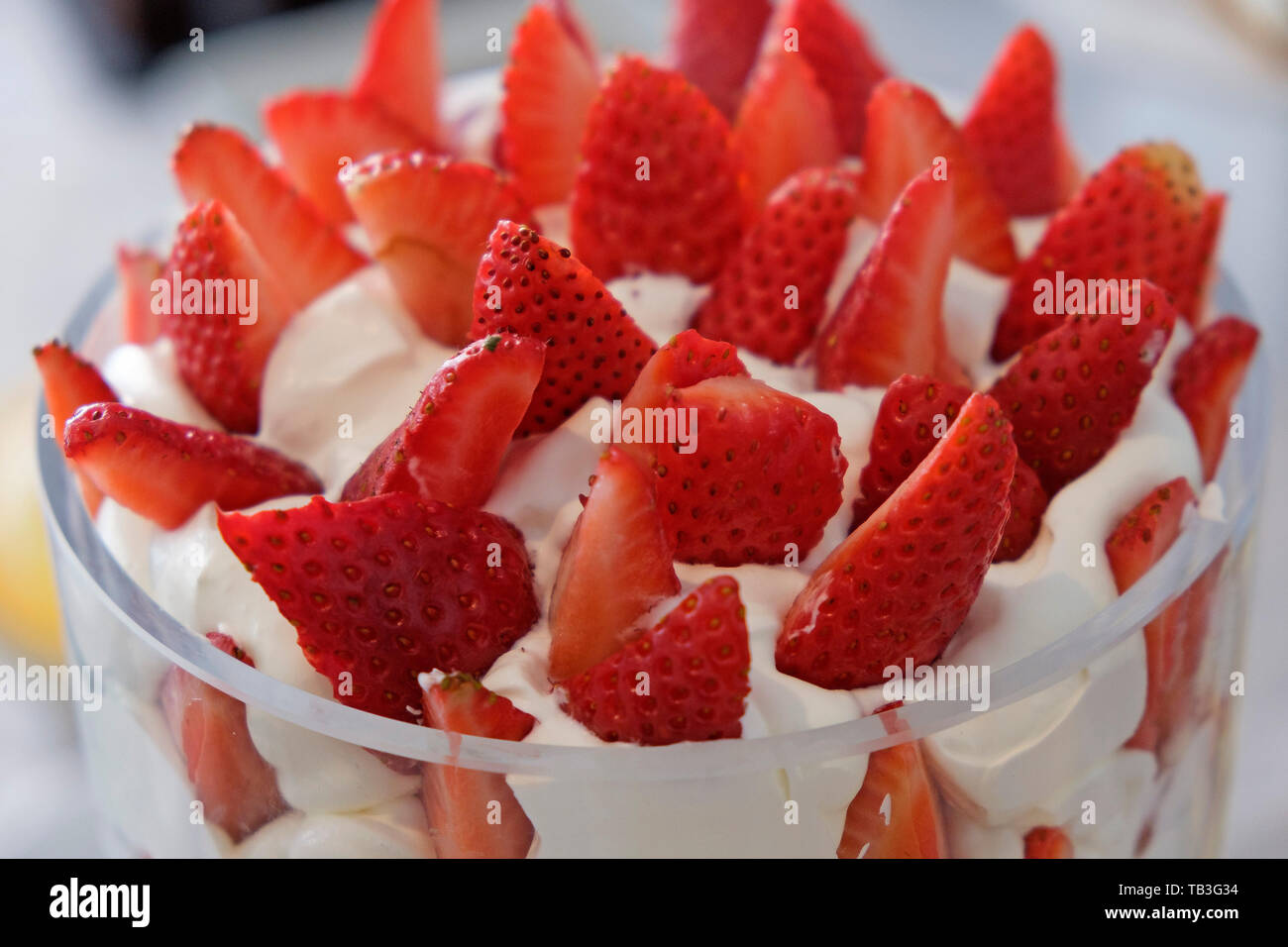 Strawberries with whipped cream Stock Photo