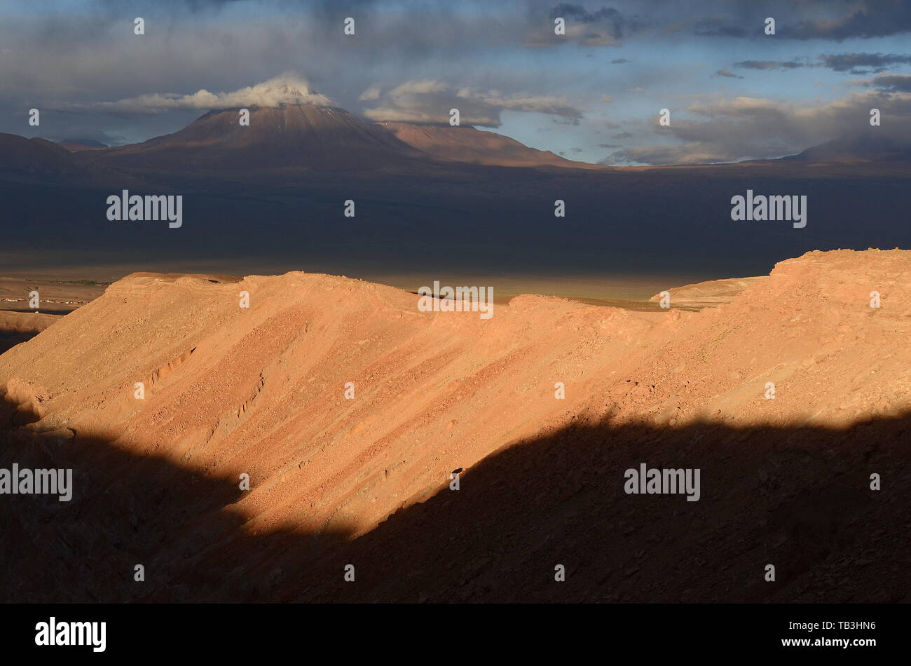 LICANCABUR AND QUIMAL VOLANOES IN THE ANDES, SEEN FROM DEATH VALLEY, CHILE. Stock Photo