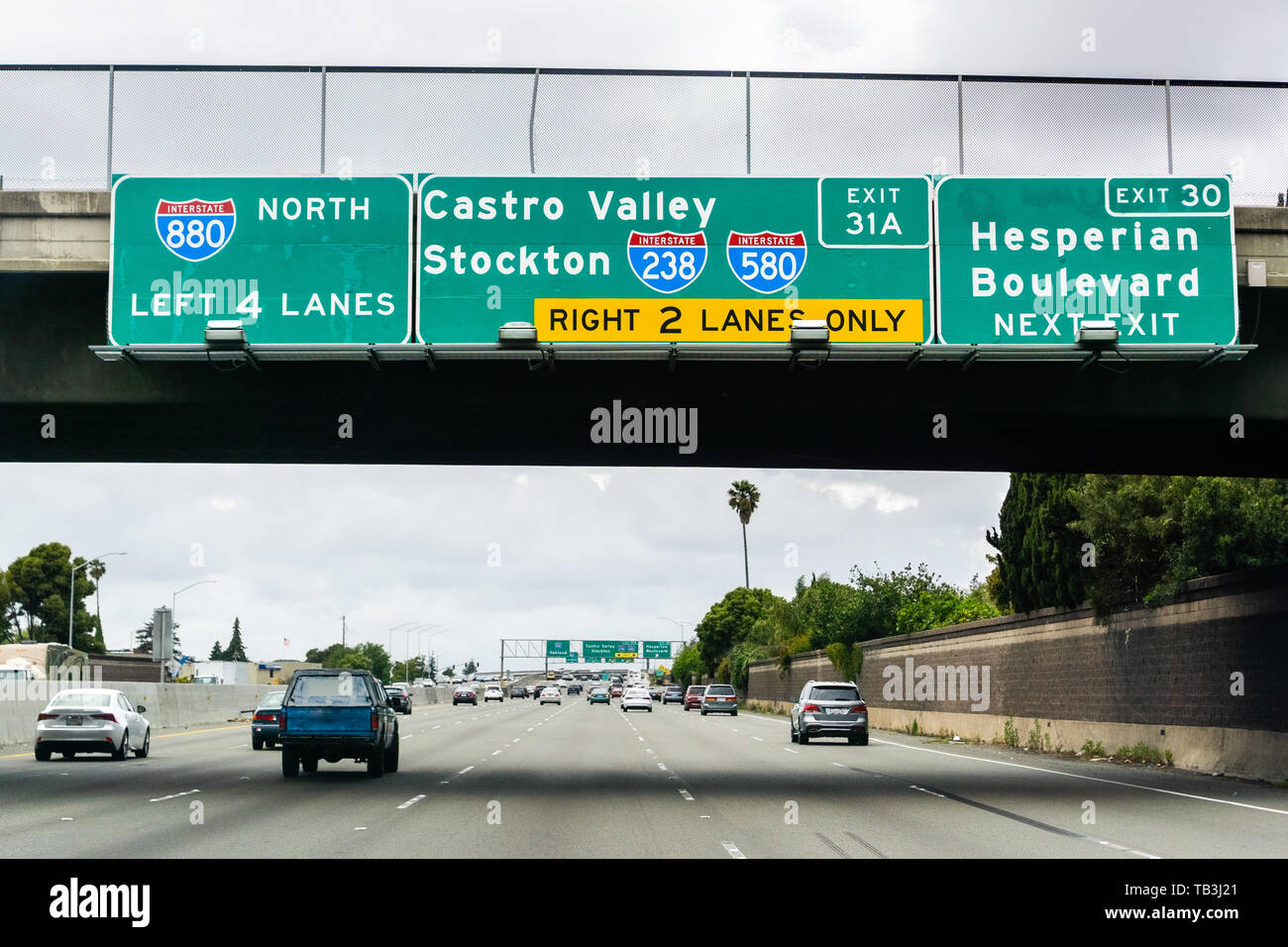 Travelling on the freeway through Hayward towards Oakland and approaching the Castro Valley / Stockton junction; East San Francisco bay area, Californ Stock Photo