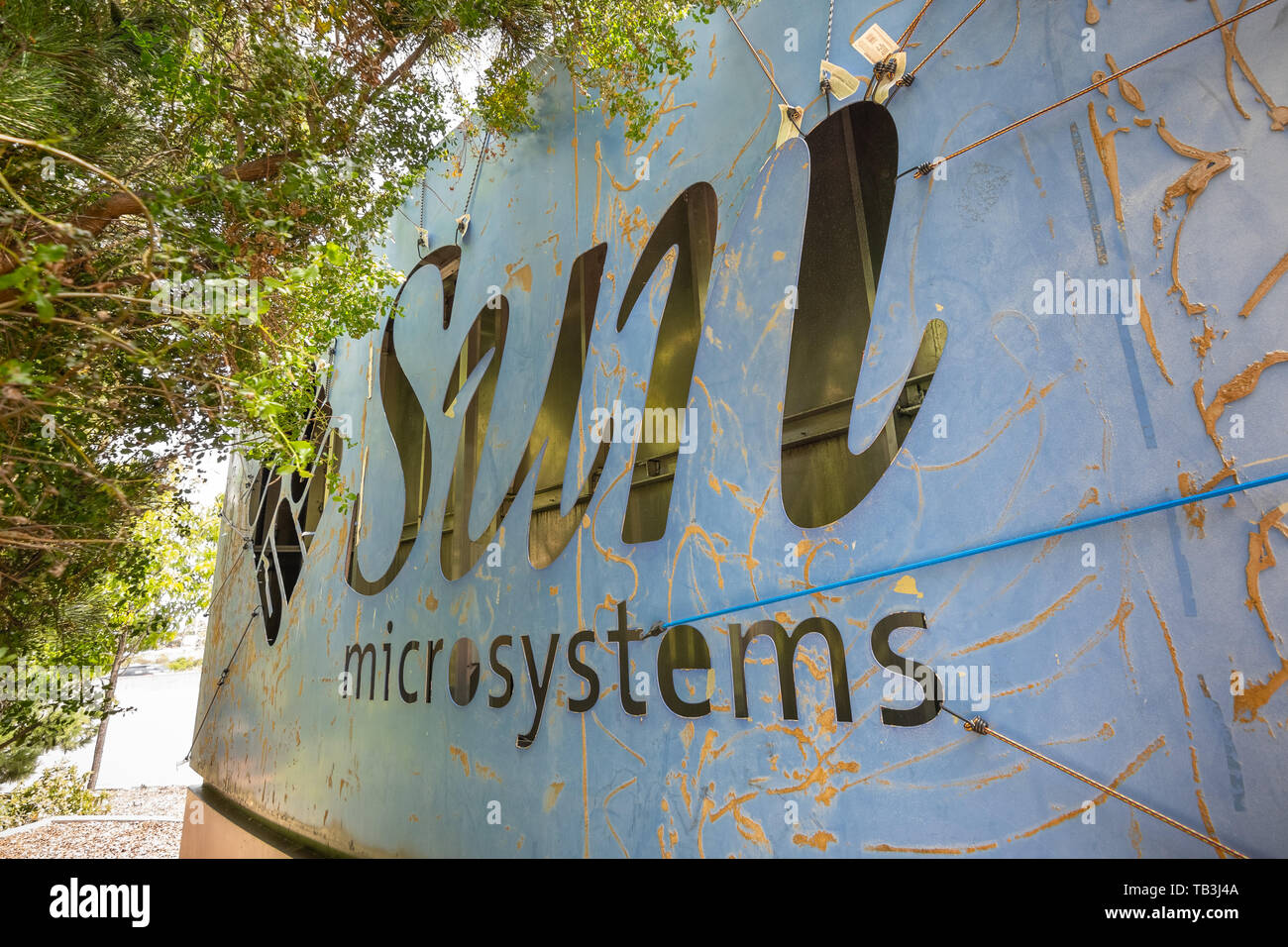 May 26, 2019 Menlo Park / CA / USA - Sun Microsystems logo on the back of the Facebook Thumbs Up sign; Facebook took over their former offices in Sili Stock Photo