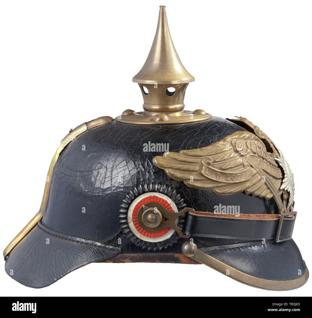 An Imperial German enlisted men pre-war Guard Regiment spiked helmet, Black leather body, front and rear visors, rear visor marked to Guard Army Corps and dated 1915. EM Prussian Guard Front plate, large brass Prussian eagle, silver guard star attached by two loops with leather inserts. Trim, spike, spike base and base rivets in brass. Replacement leather chinstraps with brass buckles attached to brass M 91 side post lugs, EM national and Prussian state colour cockades, black leather liner. USA-lot. Prussian, Prussia, German, Germany, militaria, military, object, objects, s, Editorial-Use-Only Stock Photo