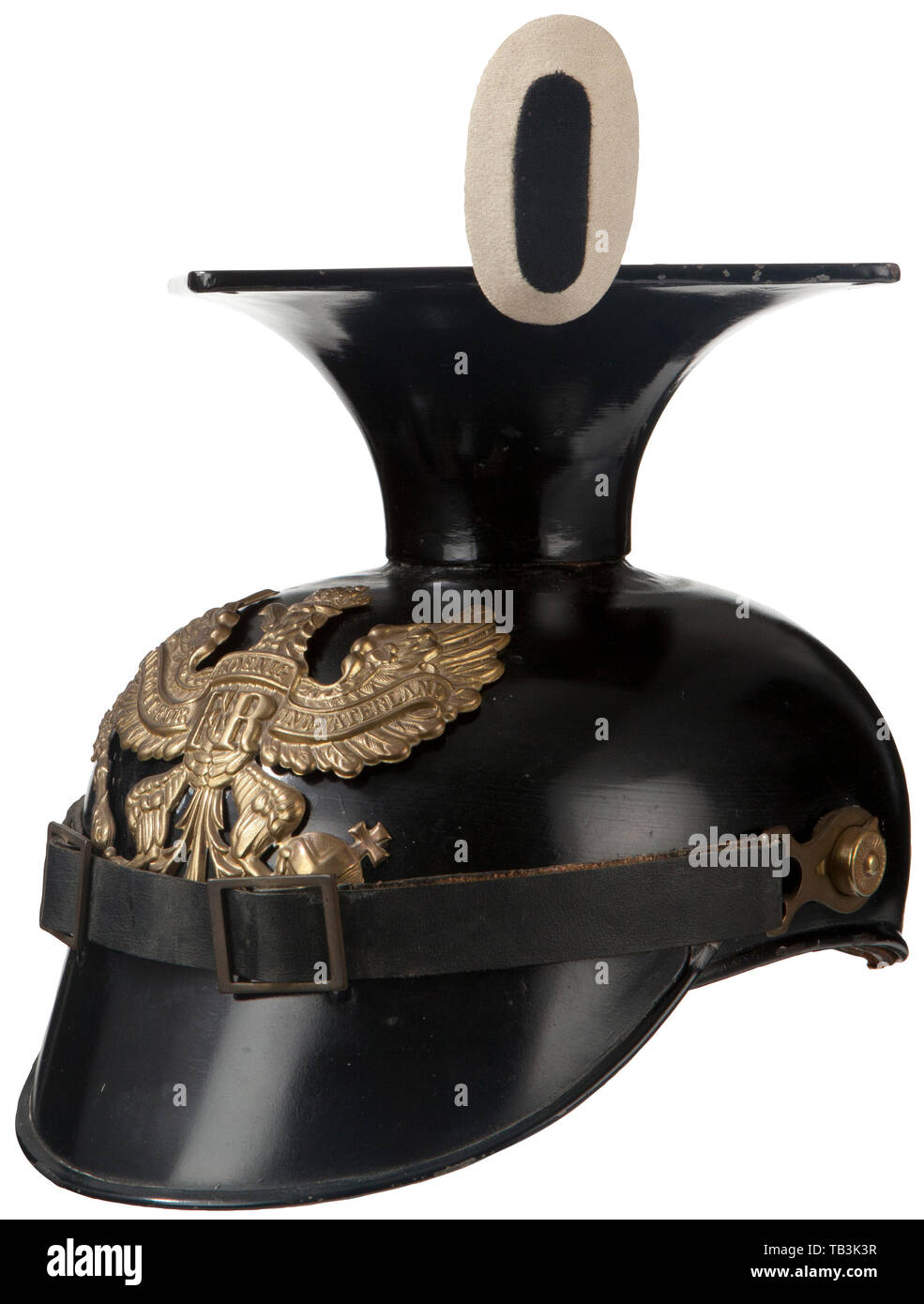 A wartime all metal enlisted Prussian Uhlan czapka, Black painted metal body and visor, possibly portions of helmet body are repainted, gold Prussian eagle front plate attached by loops with leather inserts, replacement black leather chinstrap with brass buckles attached by M 91 lug side posts, black and white EM field badge, national colours EM cockade, worn black leather liner. USA-lot. 20th century, 1910s, First World War / WWI, world war, world wars, historic, historical, Additional-Rights-Clearance-Info-Not-Available Stock Photo