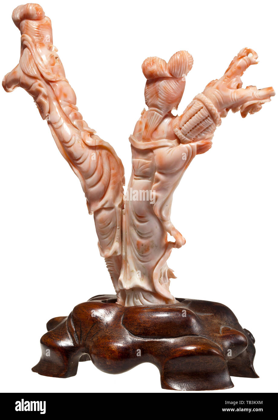 A Chinese carved coral branch, circa 1880, A carved pink coral branch, fully sculptured with the figures of two girls in long robes. Mounted on an openwork wooden base. Total height 16 cm. China, Chinese, historic, historical 19th century, Additional-Rights-Clearance-Info-Not-Available Stock Photo