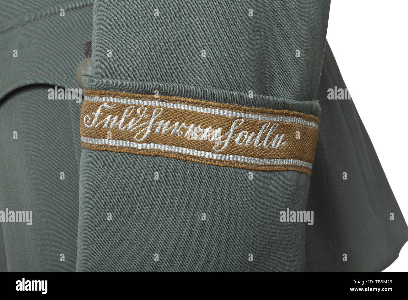 A field tunic of a medical director of the Division "Feldherrnhalle", Private purchase piece made of field-grey gabardine with dark-green collar, field-grey buttons, grey silk lining, hand-embroidered officer's eagle, sewn shoulder boards and collar patches, the left arm with original sewn sleeve band "Feldherrnhalle". The stitching on the left shoulder somewhat loosened (can easily be mended). infantry, military, armed forces, militaria, object, objects, stills, clipping, clippings, cut out, cut-out, cut-outs, historic, historical 20th century, Additional-Rights-Clearance-Info-Not-Available Stock Photo