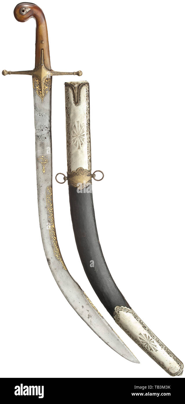 A gold-inlaid Ottoman kilij, circa 1820, Single-edged blade, broadening at the double-edged point (broken and soldered at the root). Under the cross bar on both sides ornamental gold inlay, on the obverse two gold-inlaid calligraphic cartouches. Engraved brass quillons with riveted horn grips. Wooden, shagreen leather covered and wire sewn scabbard with florally chased nickel silver and brass mounts. Length 87 cm. Ottoman, Orient, Oriental, Asia, Asian, historic, historical 19th century, Additional-Rights-Clearance-Info-Not-Available Stock Photo