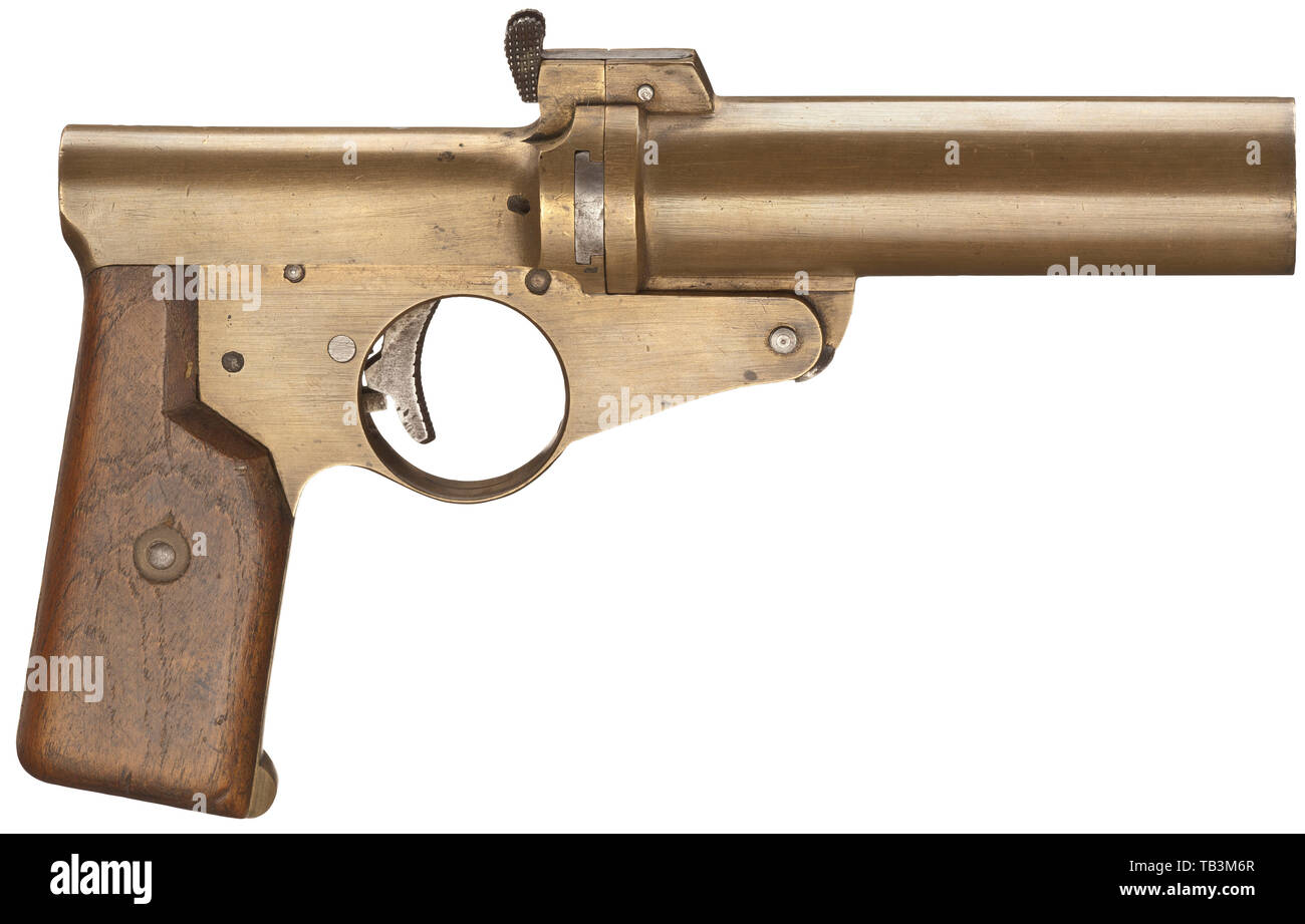 A single-barrelled signal flare pistol Mod. A.W.W. of the Imperial Navy, Cal. 4, no. 37. Matching numbers. Drop barrel with snapper lock, length 115 mm. Total length 220 mm. Weight 860 g. Internal hammer. Safety. Signal pin. Construction attributed to Artilleriewerkstätten Wilhelmshaven (A.W.W.). On pommel navy acceptance mark crown/M. No further stamps or inscriptions. Brass grip frame and barrel. Ribbed trigger as well as opening lever, breechblock, safety, mechanical parts and screws made of steel. Matching-numbered, smooth walnut grip panels., Additional-Rights-Clearance-Info-Not-Available Stock Photo