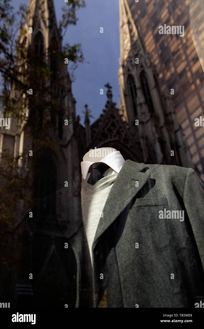 St. Patrick's Cathedral on Fifth Avenue reflected in Banana Republic