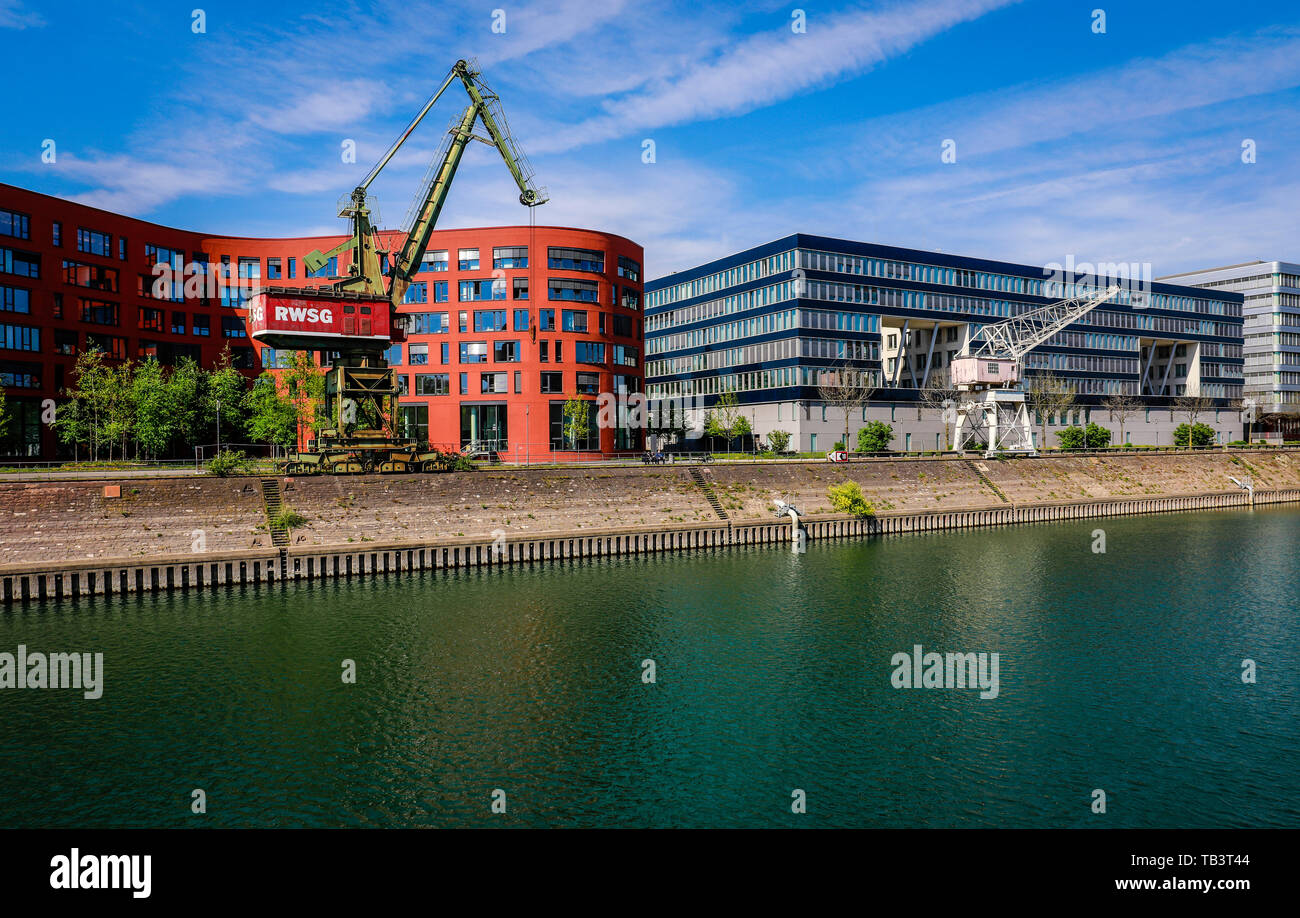 18.04.2019, Duisburg, North Rhine-Westphalia, Germany - Inner harbour Duisburg with the wave-shaped building of the state archive North Rhine-Westphal Stock Photo