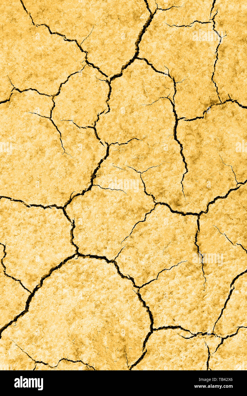 Waterless planet. Dry yellow cracked earth. Hot climate and drought ...