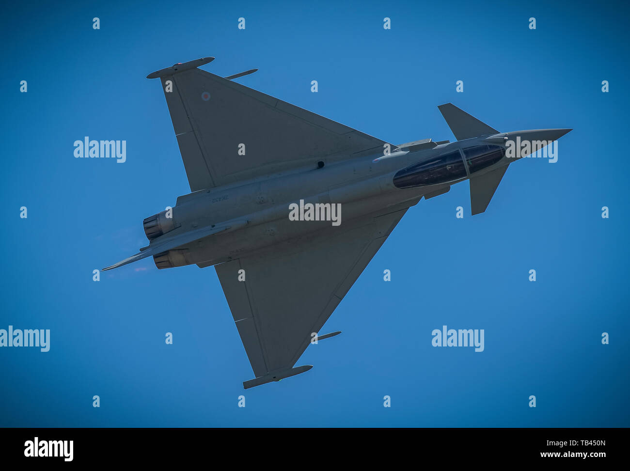 underside and undercarriage of an RAF Typhoon Jet in Flight Stock Photo