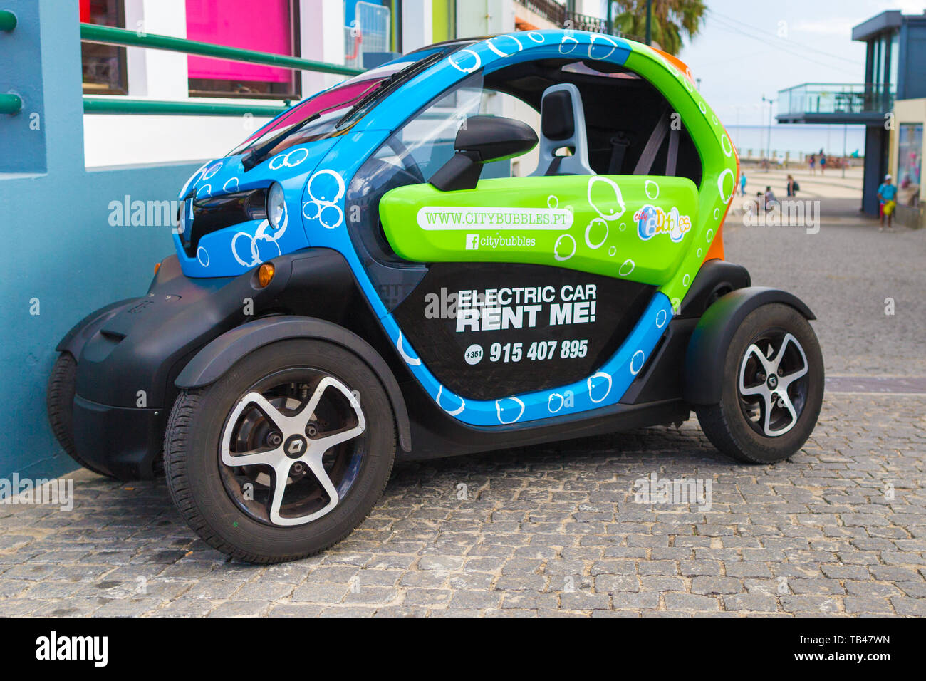 Porto Santo, Portugal July 31, 2018 Small funny electric car from