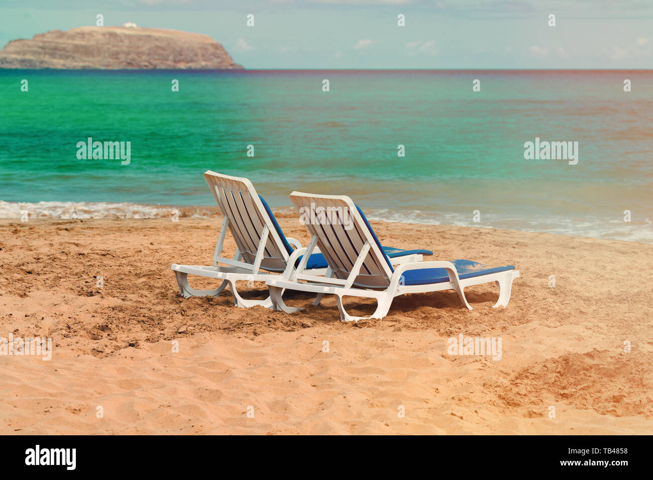 Empty deck chairs on seashore hi-res stock photography and images - Alamy