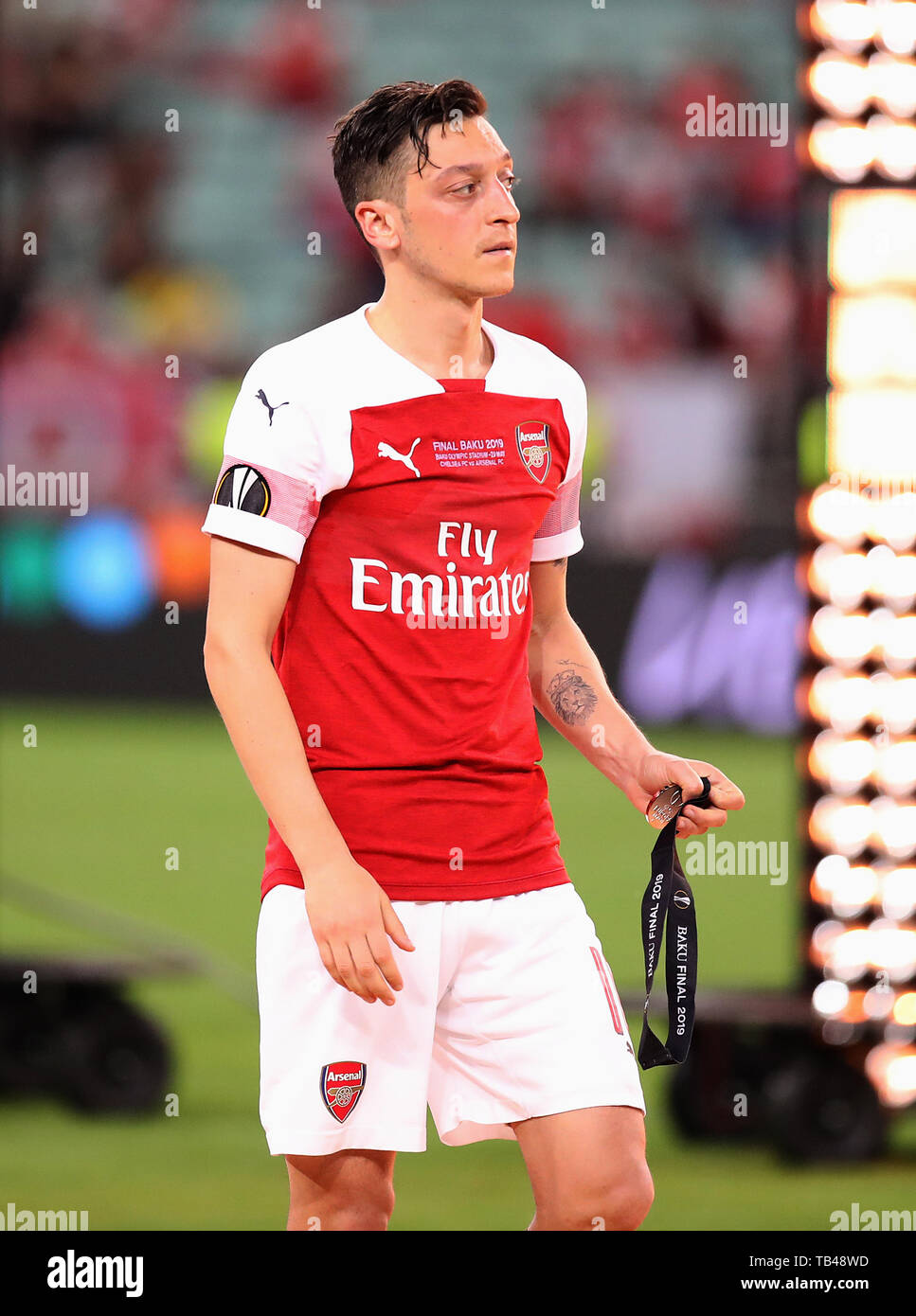 Arsenal S Mesut Ozil Takes Off His Runners Up Medal After The Uefa Europa League Final At The Olympic Stadium Baku Azerbaijan Stock Photo Alamy Arsenal S Mesut Ozil Takes Off His Runners Up Medal After The Uefa Europa League Final At The Olympic Stadium Baku Azerbaijan Stock Photo Alamy