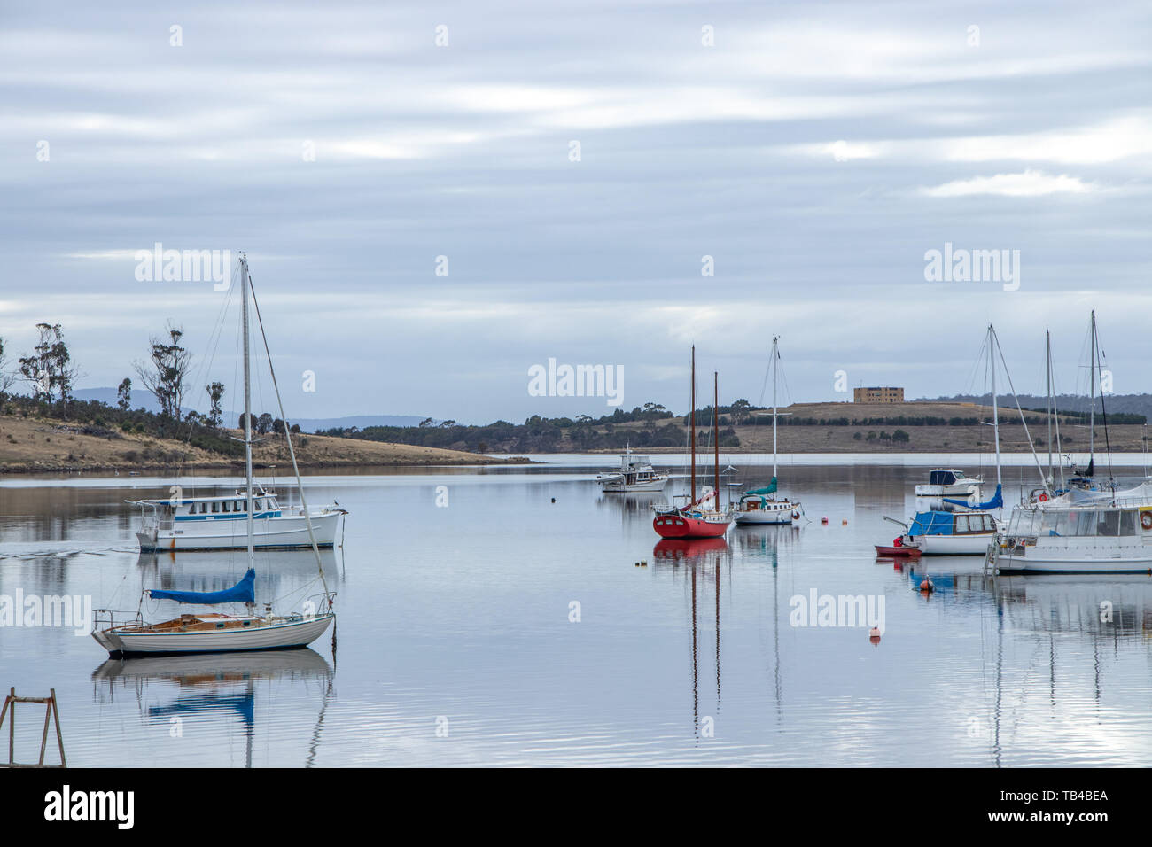 Boats anchored in Dunalley inlet in Tasmania Stock Photo