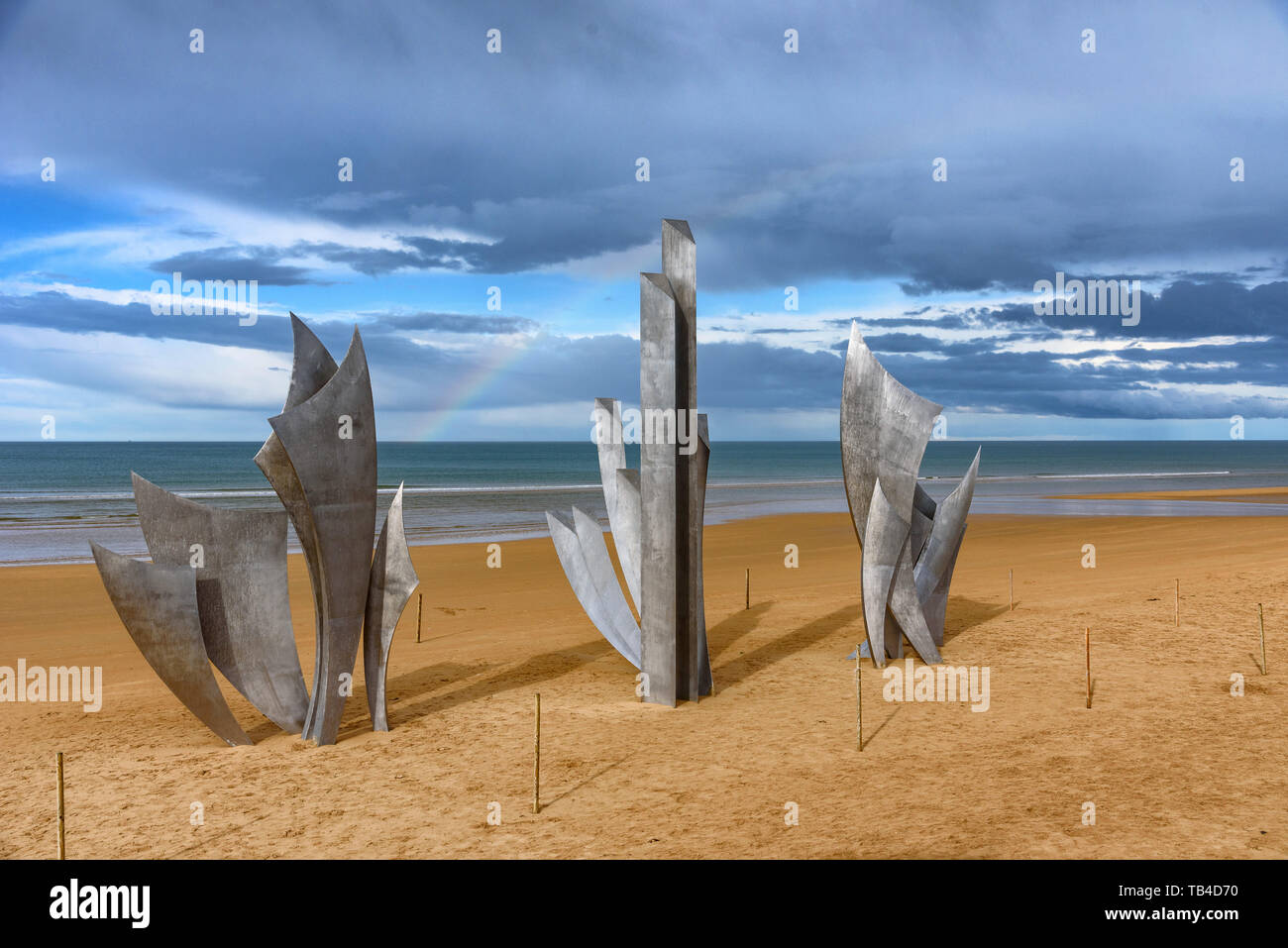 The Les Braves Omaha Beach Memorial With A Rainbow In The