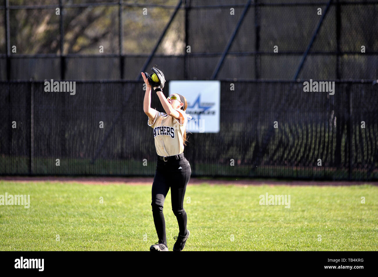 Outfielder making a routine catch of a fly ball Stock Photo Alamy
