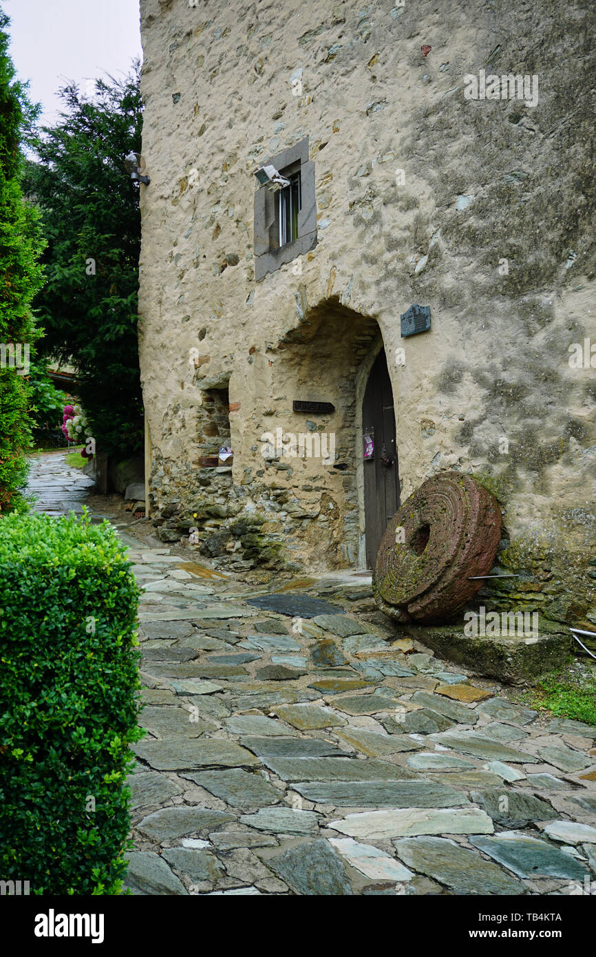 Medieval Stone Tower with Mill Stone Decoration Stock Photo