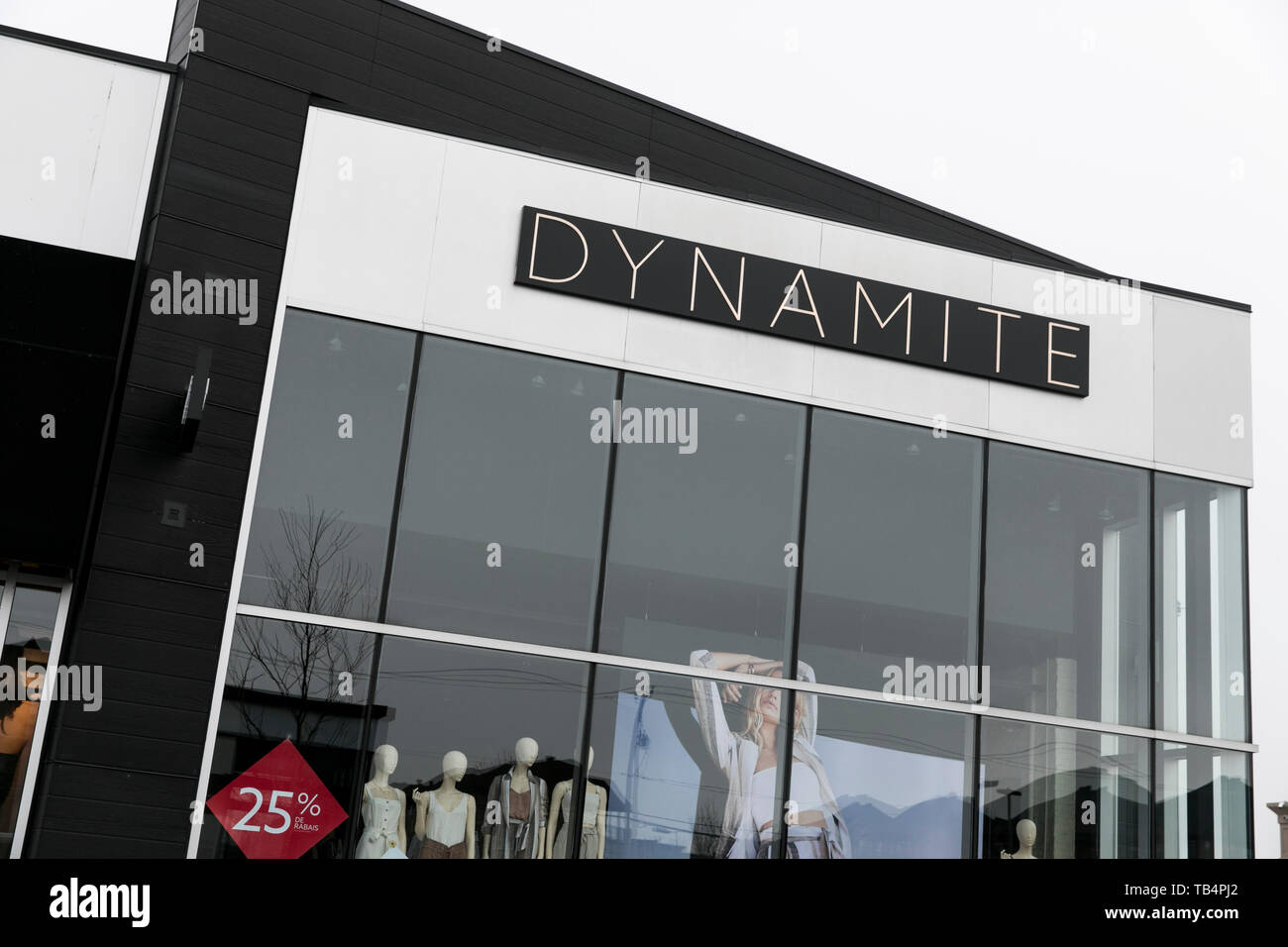 A logo sign outside of a Dynamite retail store location in Vaudreuil-Dorion, Quebec, Canada, on April 21, 2019. Stock Photo