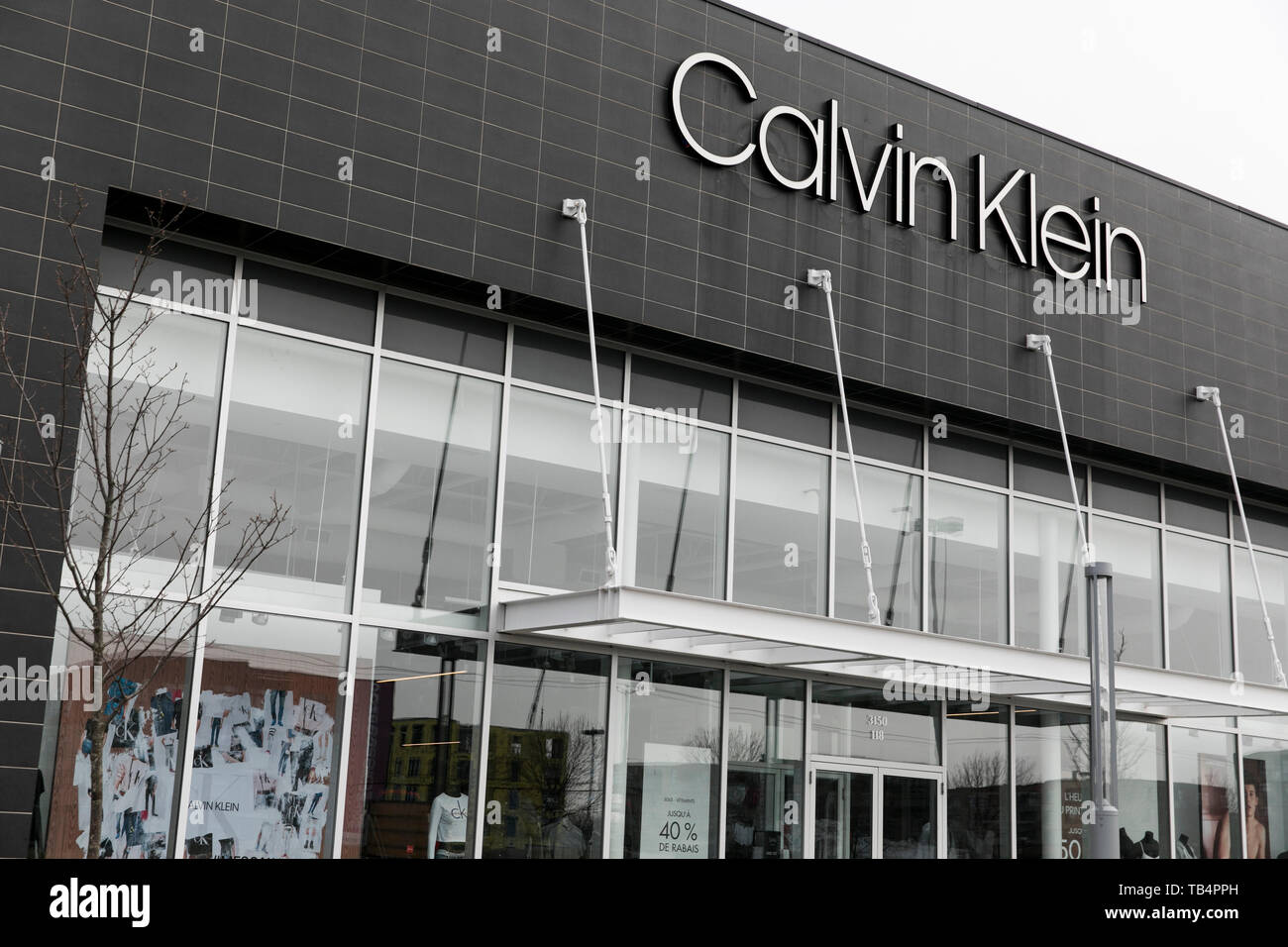 A logo sign outside of a Calvin Klein retail store location in  Vaudreuil-Dorion, Quebec, Canada, on April 21, 2019 Stock Photo - Alamy