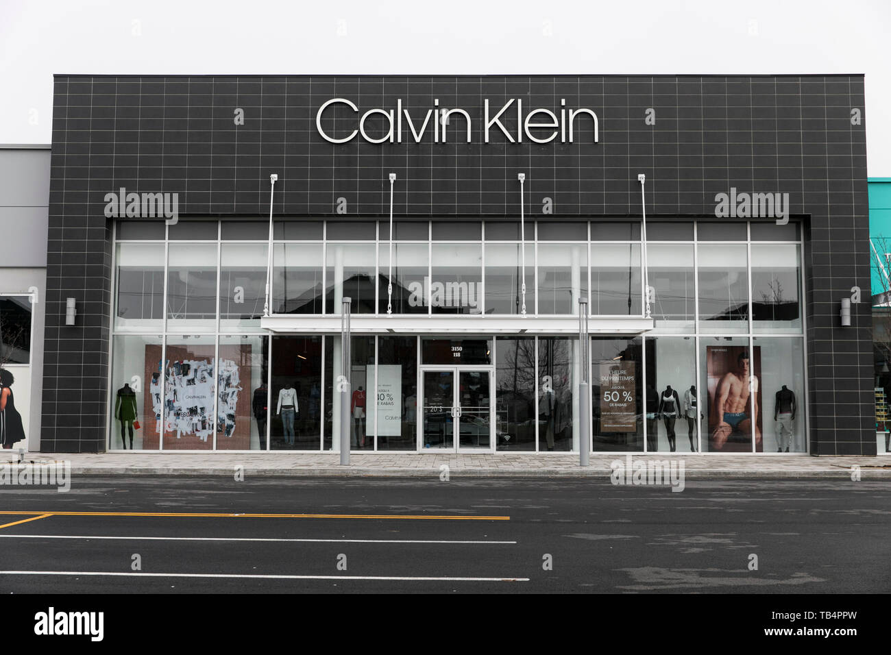 A logo sign outside of a Calvin Klein retail store location in  Vaudreuil-Dorion, Quebec, Canada, on April 21, 2019 Stock Photo - Alamy