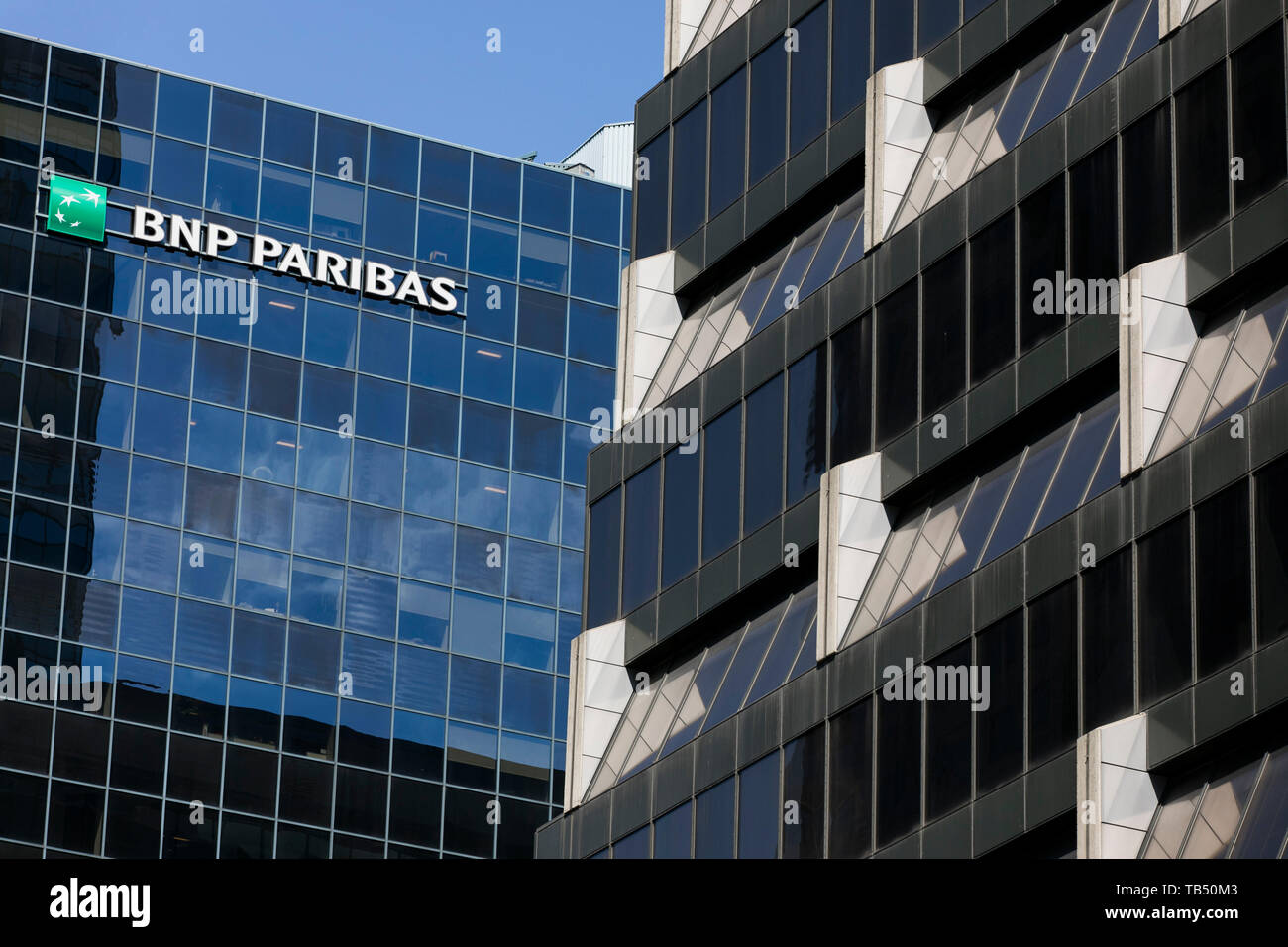A logo sign outside of a facility occupied by BNP Paribas in Montreal, Quebec, Canada, on April 21, 2019. Stock Photo