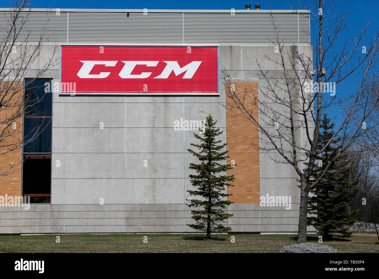 A logo sign outside of a facility occupied by Sport Maska Inc. (CCM Hockey) in Saint-Laurent, Quebec, Canada, on April 21, 2019. Stock Photo
