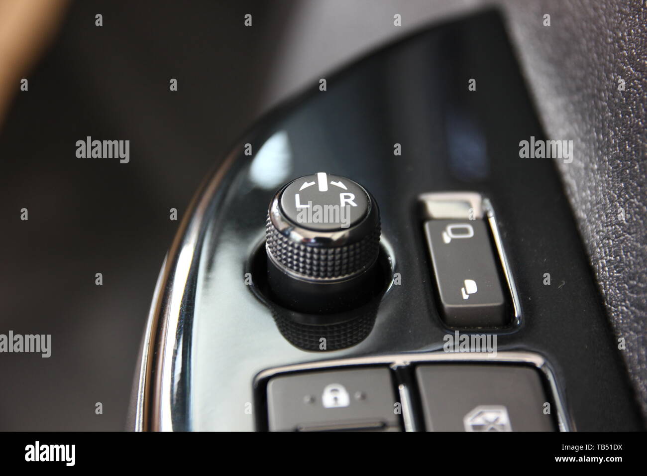 button control electric car mirror Stock Photo