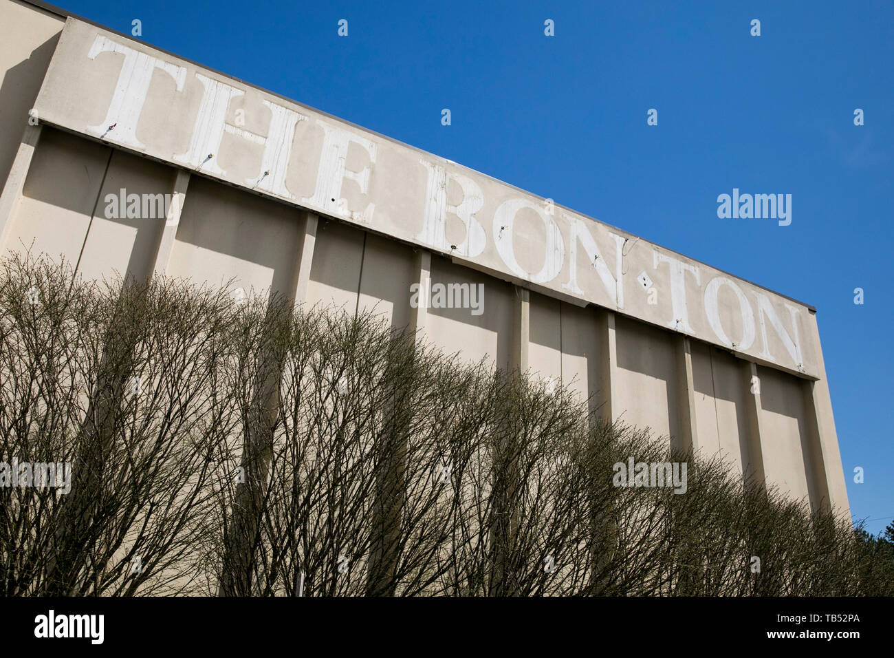 The outline of a The Bon-Ton logo sign outside of a closed retail store location in Queensbury, New York, on April 23, 2019. Stock Photo