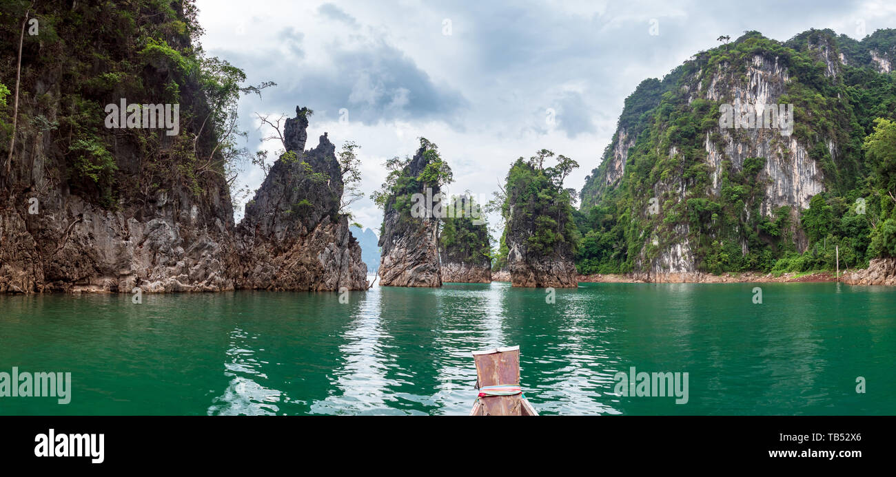 Scenic landscape of boat view in the big river and reservoir dam with mountain and nature forest Stock Photo