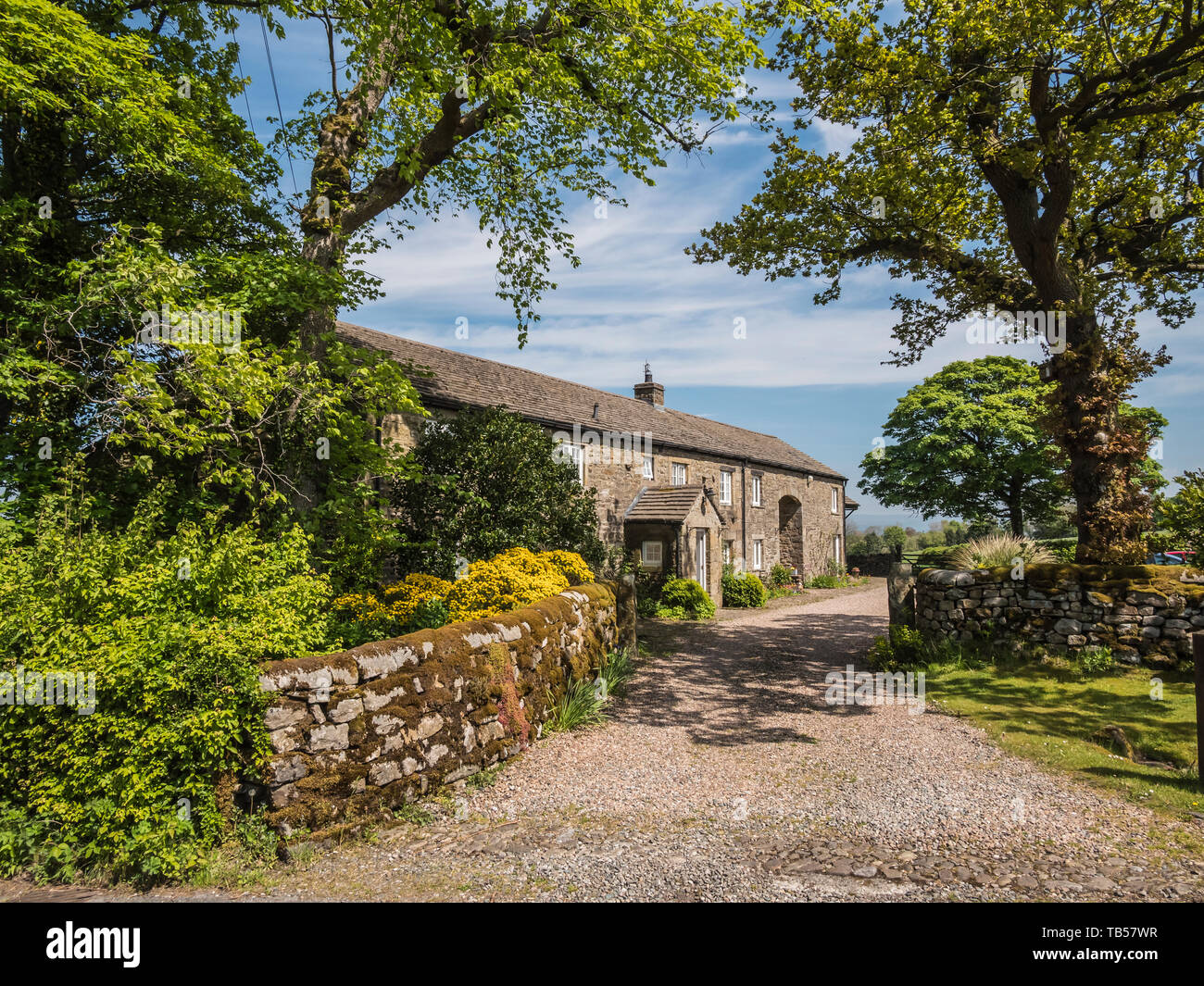 Town and Country rural pride at this charming farmhouse-home on the edge of the Yorkshire Dales Stock Photo