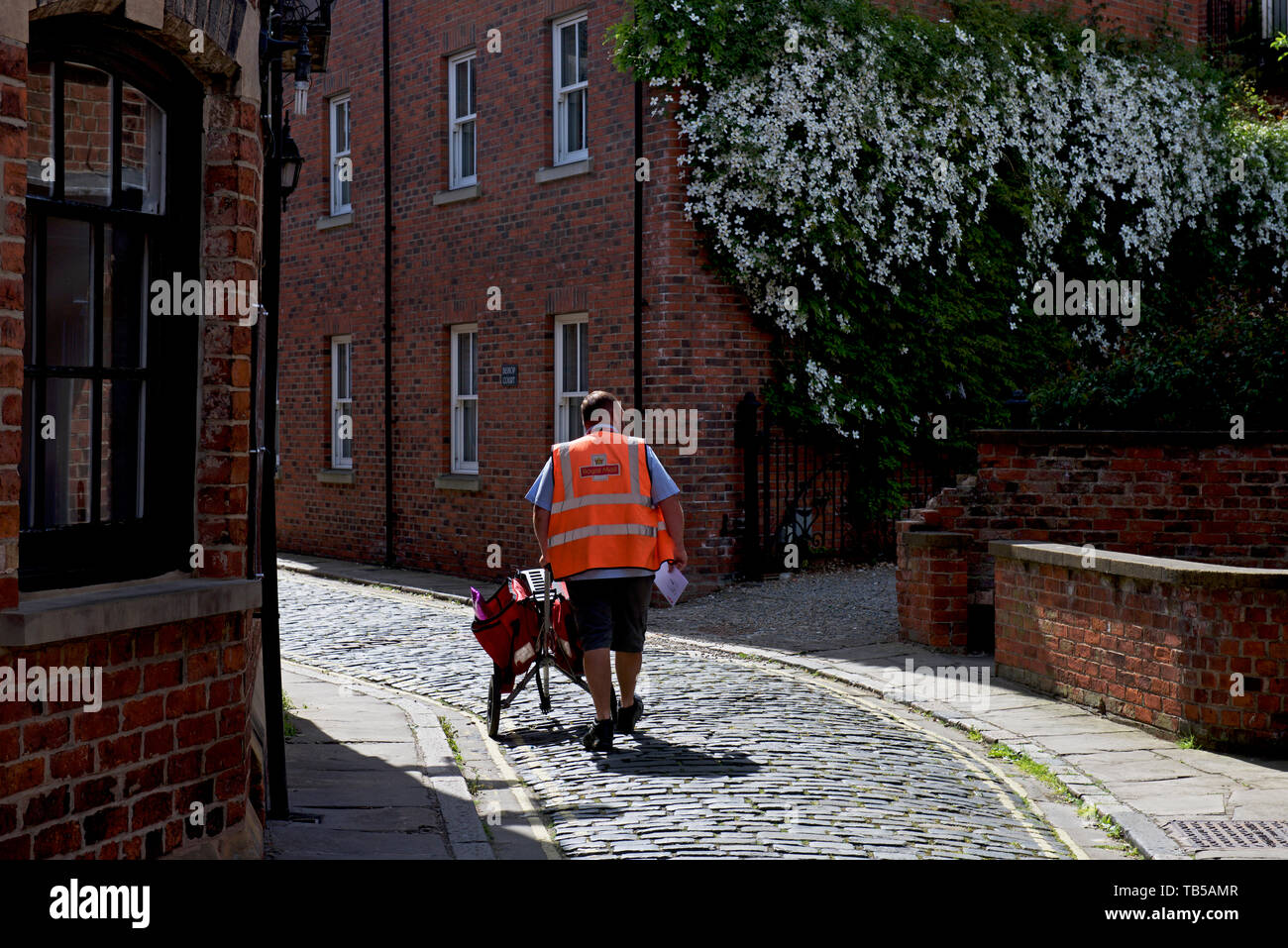 English postman uniform hi-res stock photography and images - Alamy