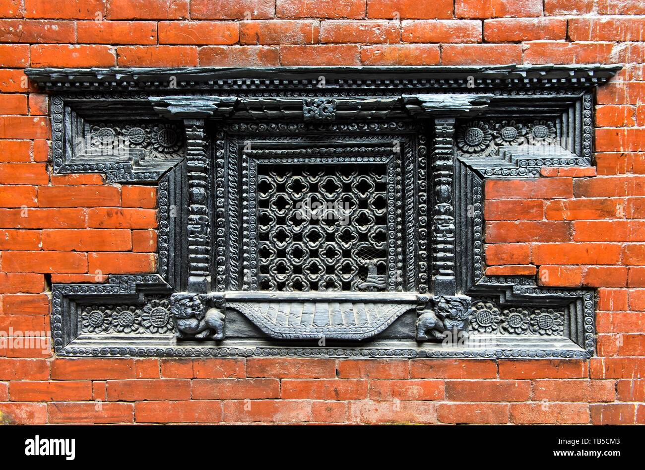 Artfully carved window grilles in traditional Newar style in Kumari Chowk inner courtyard, Kumari Bahal Temple, Durbar Square, Kathmandu, Nepal Stock Photo