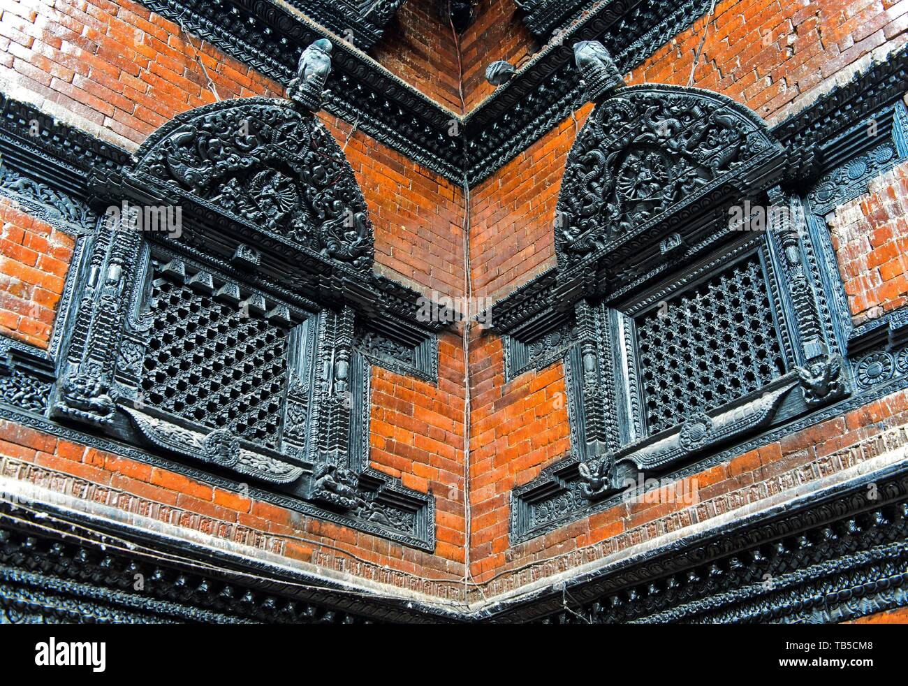 Artfully carved window grilles in traditional Newar style in Kumari Chowk inner courtyard, Kumari Bahal Temple, Durbar Square, Kathmandu, Nepal Stock Photo