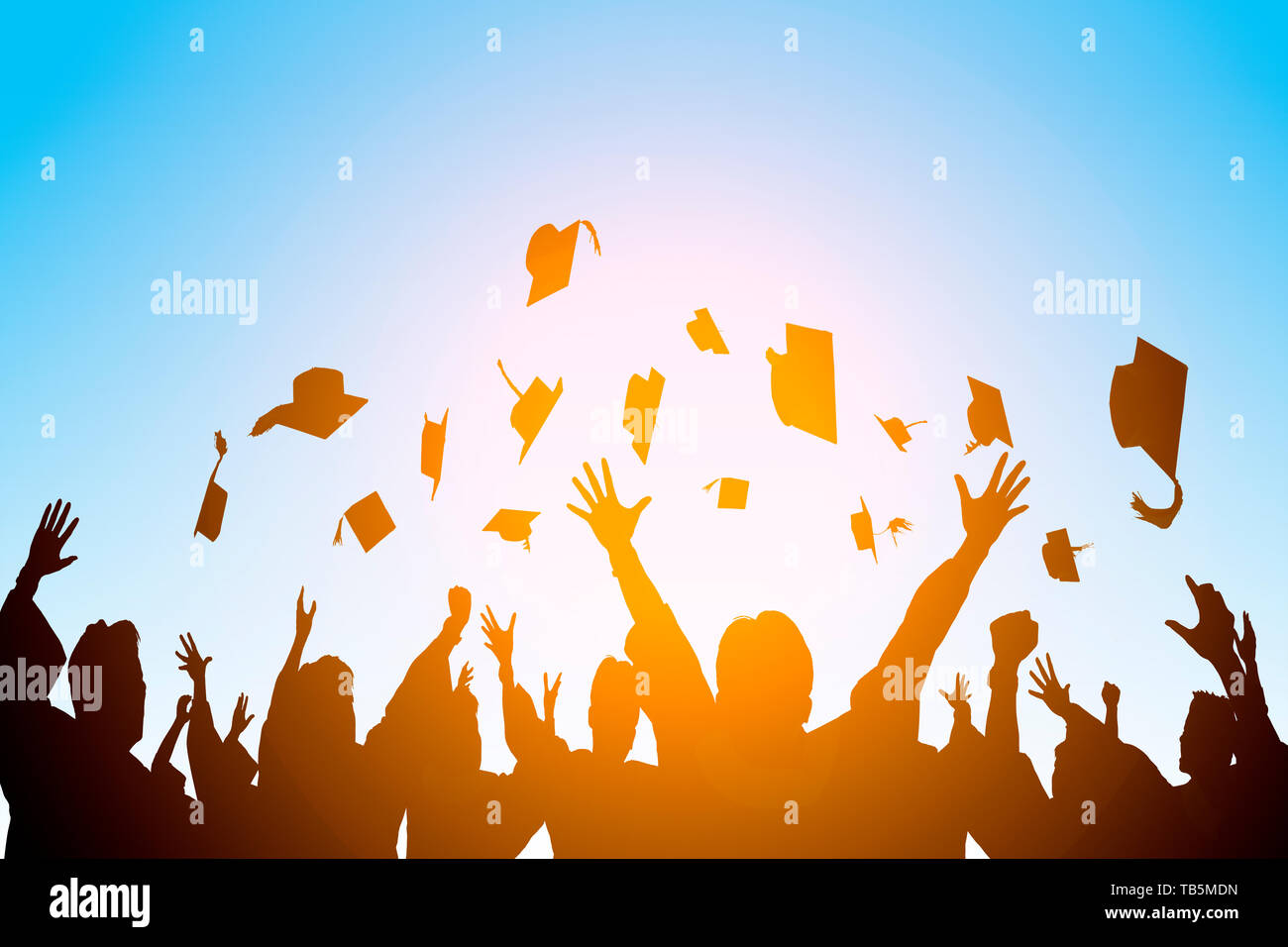 happy students throwing graduation caps in the Air Stock Photo Alamy
