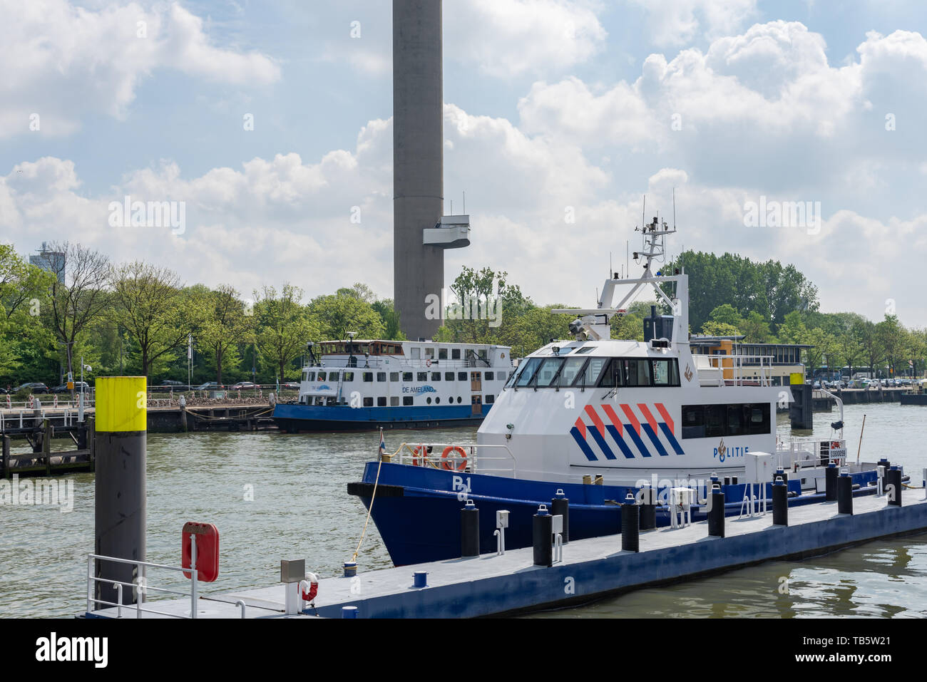 Rotterdam, Netherlands - April 29, 2019 : Rotterdam water police port with a police boat in the foreground Stock Photo