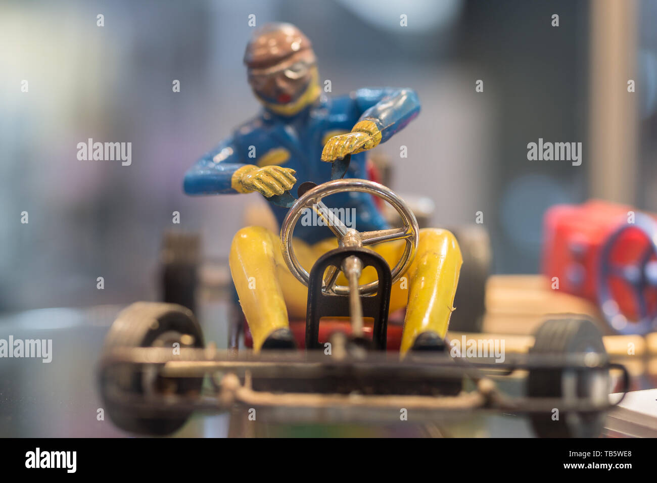 Vintage Plastic Toy of a Pilot with Helmet and Glasses Driving a Go