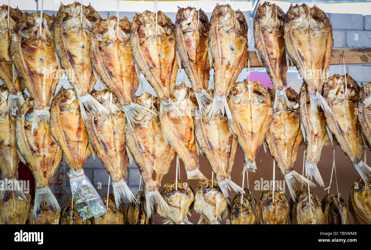 Many dried fish called stockfish for sale at european market Stock