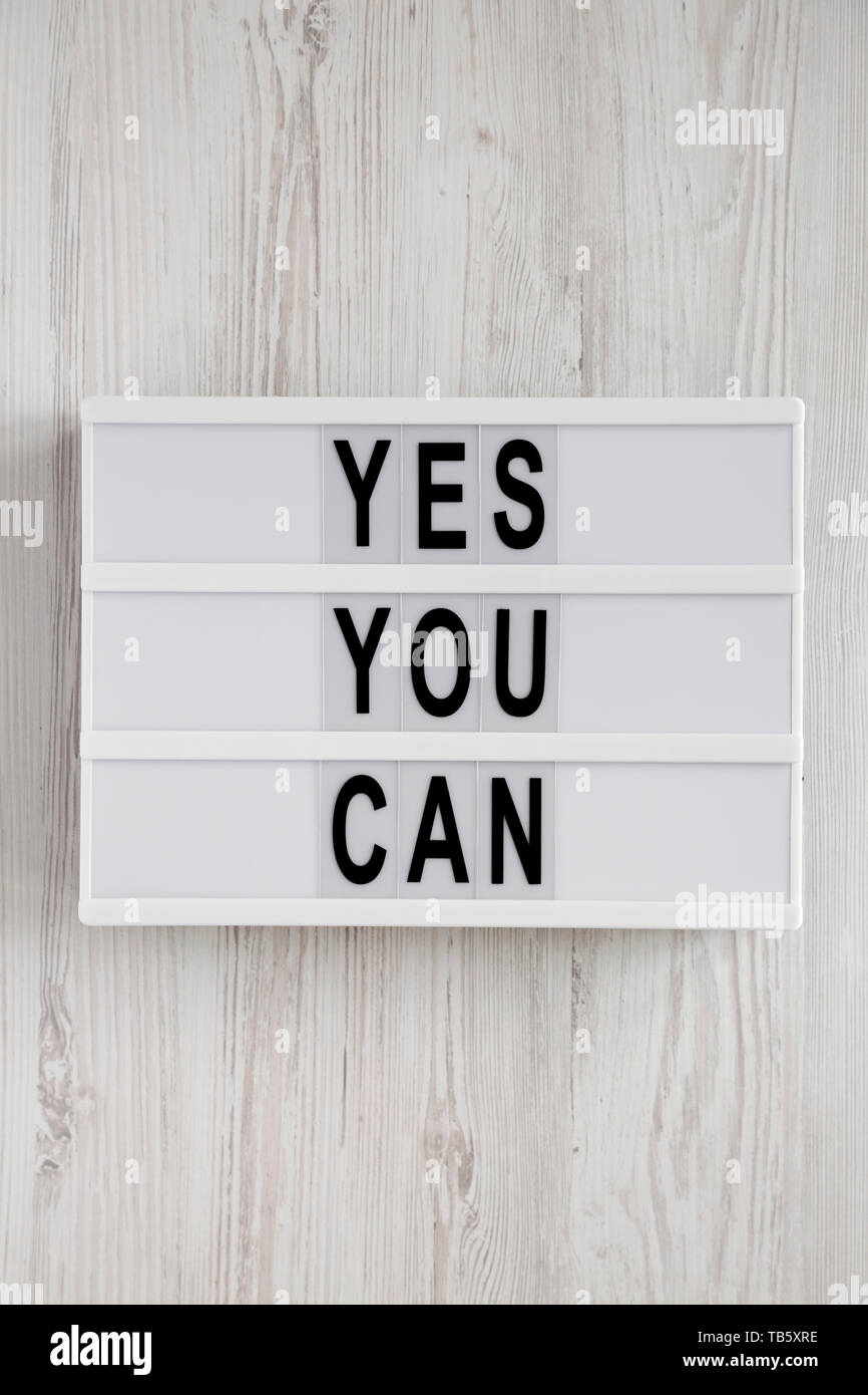 Yes You Can Words On A Modern Board Over White Wooden Surface Top View Overhead From Above Flat Lay Close Up Stock Photo Alamy