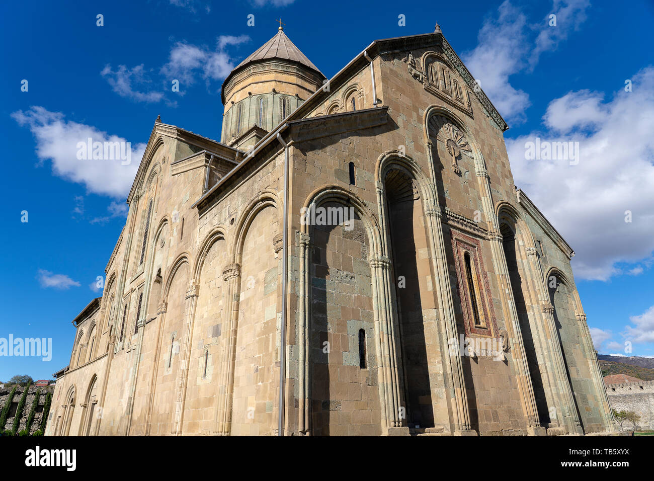 Old Orthodox cathedral in historical town Mtskheta near Tbilisi, Georgia. Autumn sunny day. Stock Photo