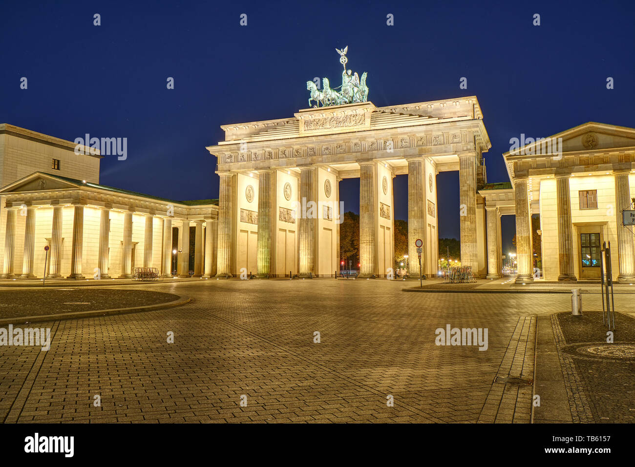 The famous Brandenburger Tor in Berlin illuminated at dawn Stock Photo