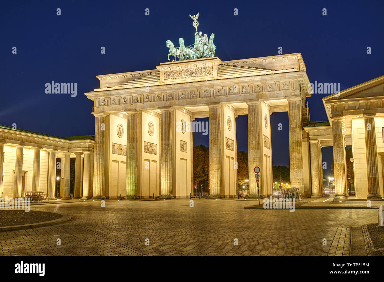 The famous Brandenburg Gate in Berlin illuminated at night Stock Photo