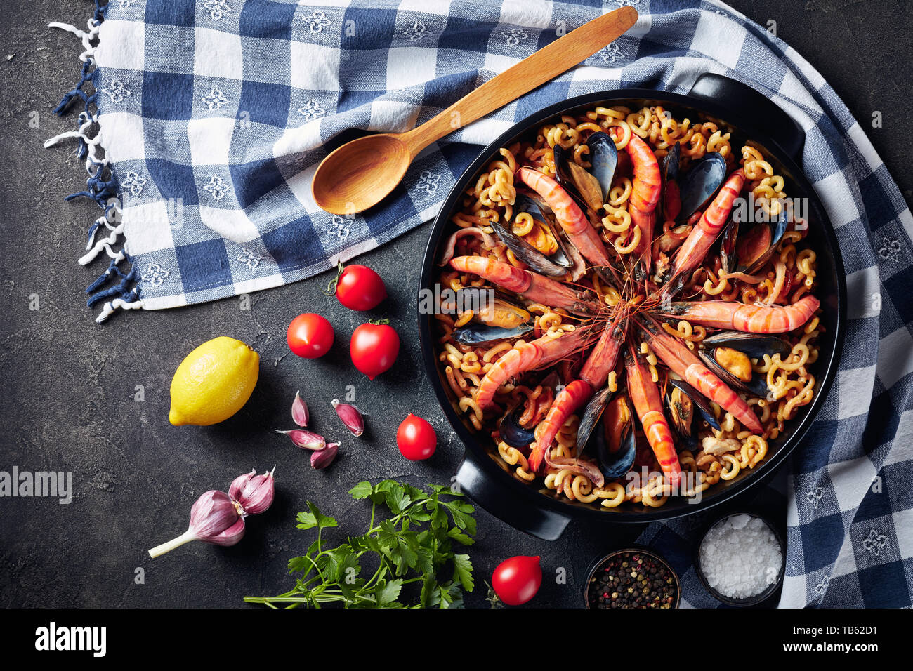 Fideua, a Paella like spanish dish with special pasta, king prawns