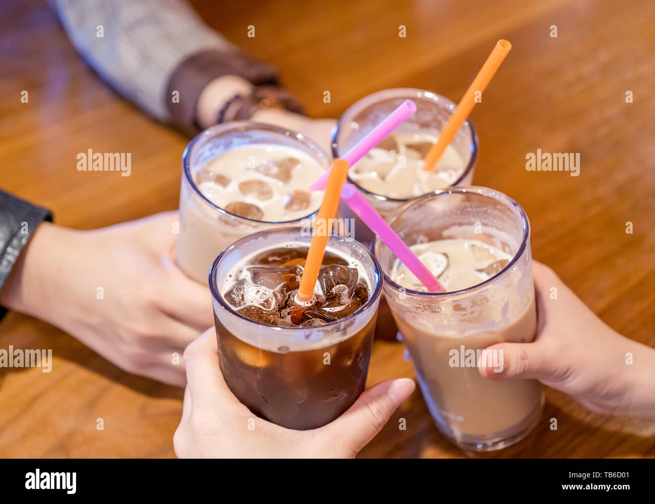 Party concept, girl with friends hold coffee cups and say cheers happy  hangout together in cafe, lifestyle, copy space, top view, close up Stock  Photo - Alamy